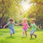 Children Running In the Grass