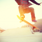 Teen Boy Doing A Skateboard Trick