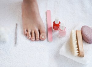 Pedicure foot, nail file, nail polish, pumice stone, pedicure