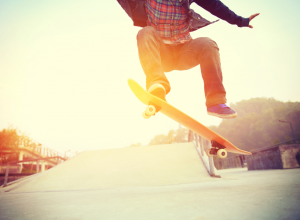 Teen Boy Doing A Skateboard Trick