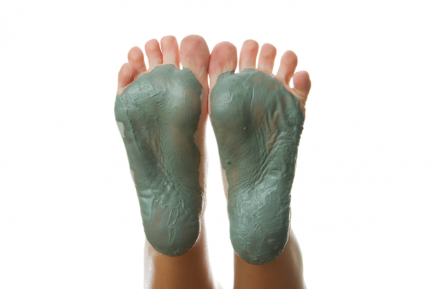 Feet Covered in a Homemade Mud Bath Treatment