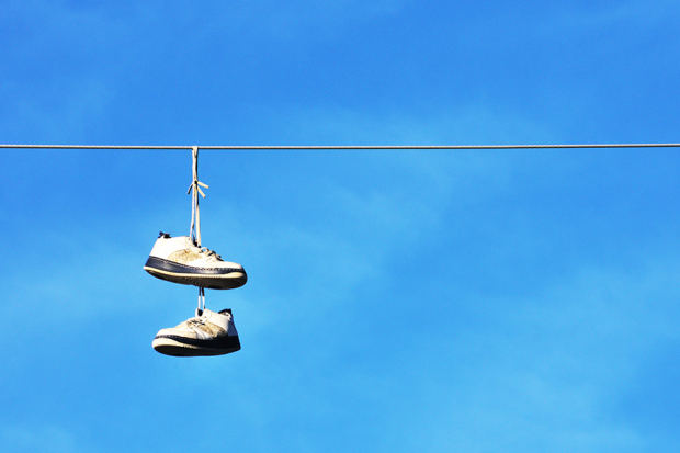 Ever Seen Shoes On Power Lines? Here's Why. | Footfiles